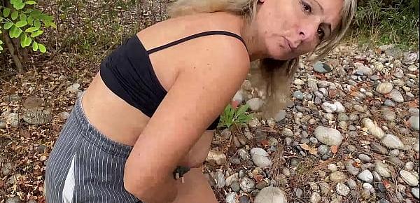  Busty MILF almost caught while fucking by the river